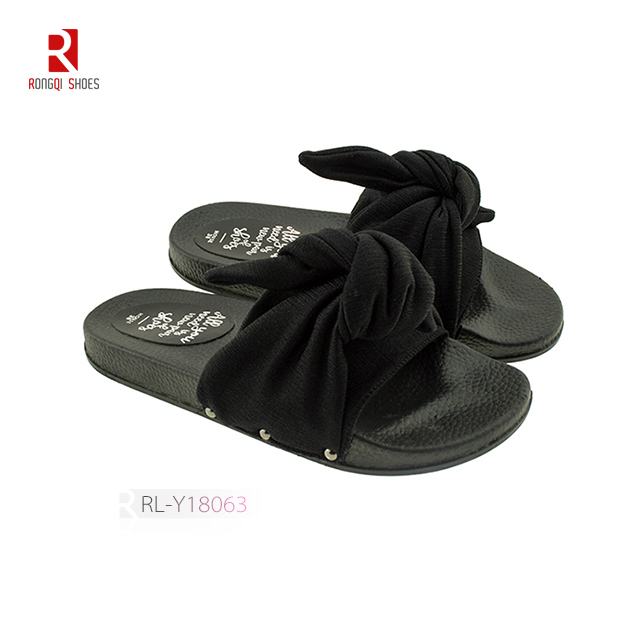 Wholesale Normcore style outdoor and indoor women EVA black slides with knot print logo 